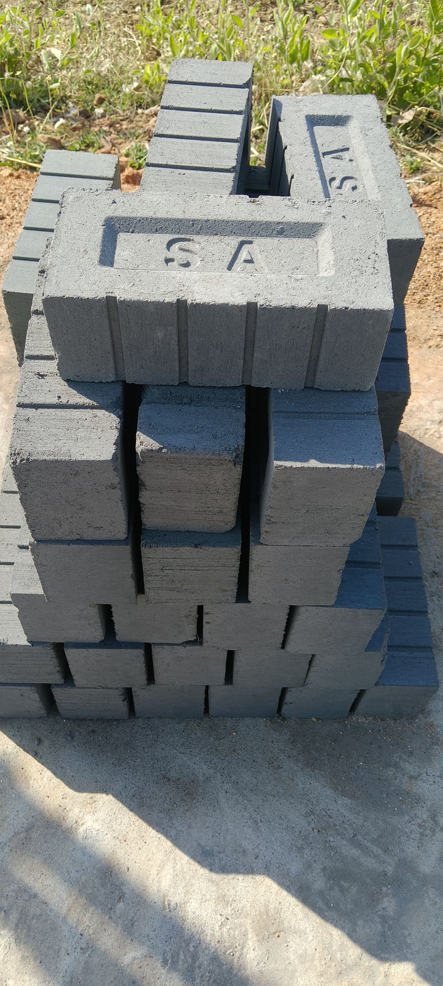 Stack of SA Bricks with SA stamp visible