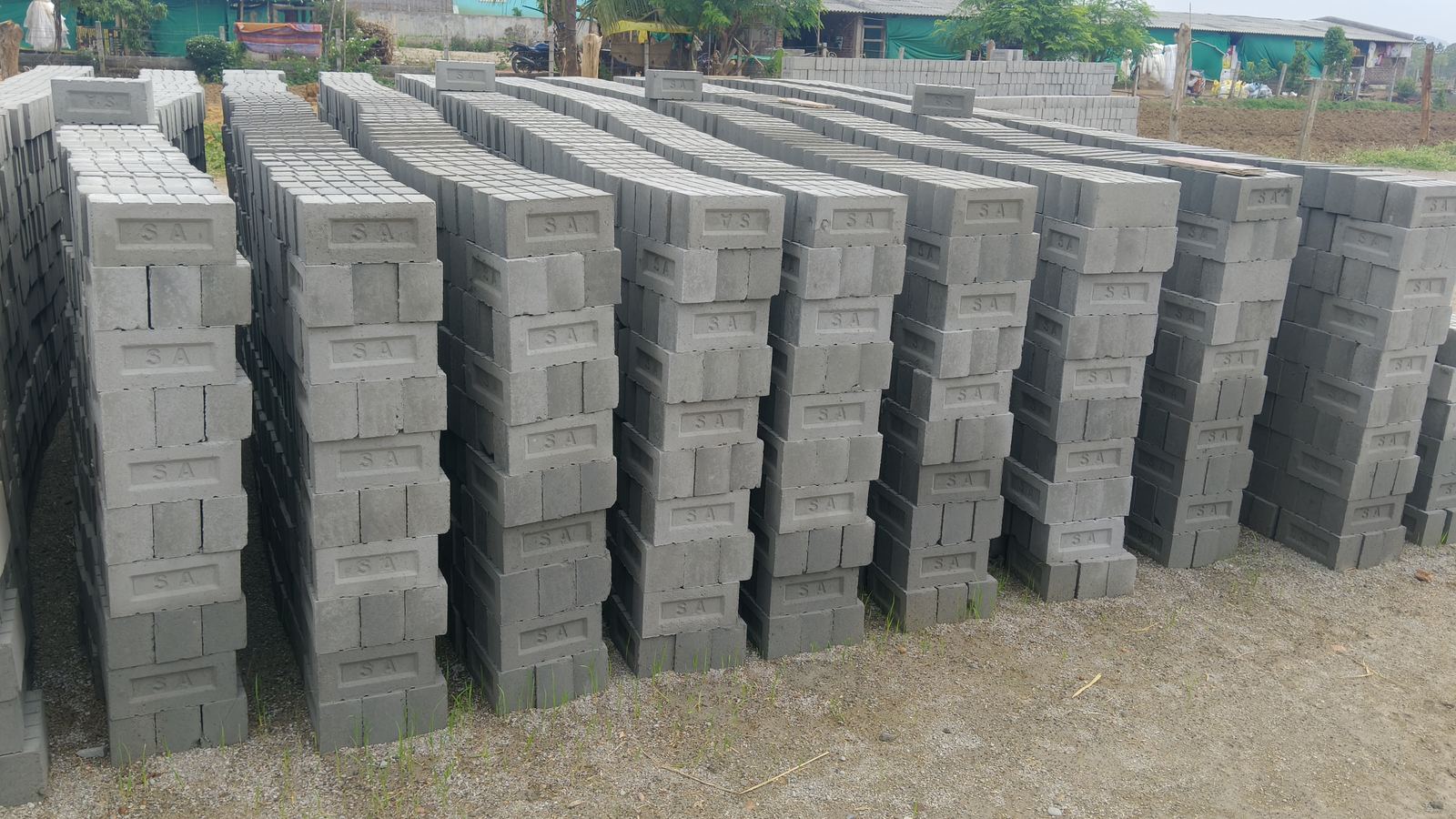 Rows of SA Bricks stacked in the yard